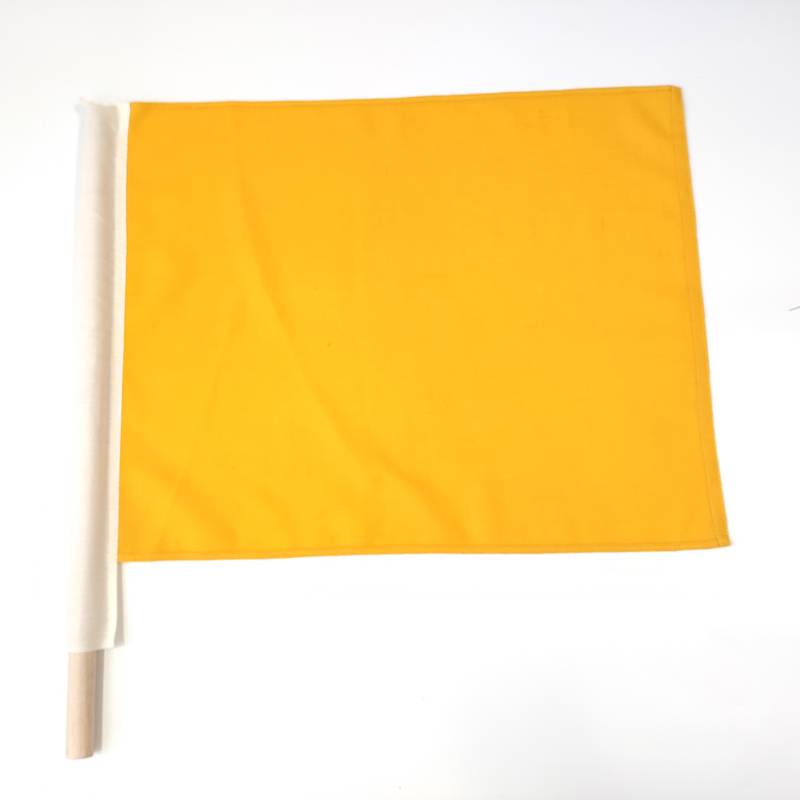 Yellow flag + wooden pole